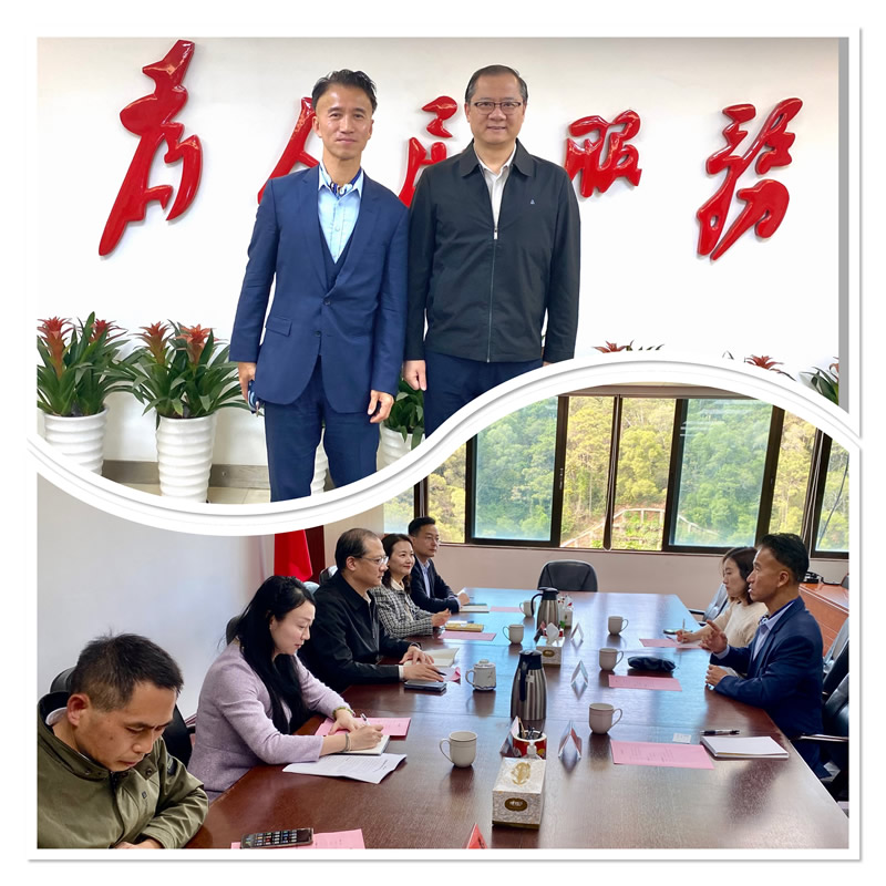 郑震生(上图左)与厦门市商务局局长陈颢颖 (上图右)合照
